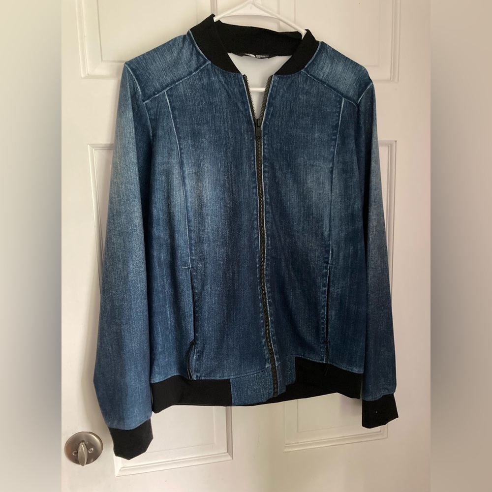 North Face stretchy “Jean” looking zip up jacket.